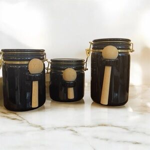 Elegant Black Canister Set with Wooden Handles